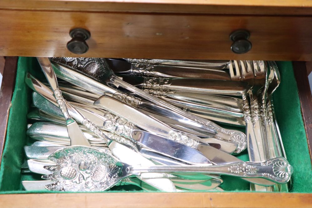 A Community silver plated canteen in three drawer pine chest, 36cm